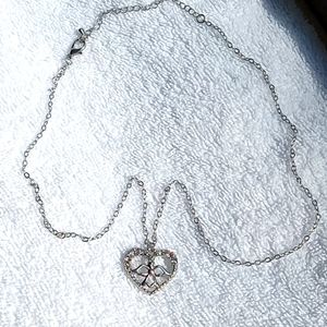 NEW.   RHINESTONE ANGEL PENDANT WITH LOBSTER CLASP.  SILVER CHAIN.